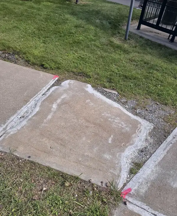 Replaced sidewalk panel, 2026